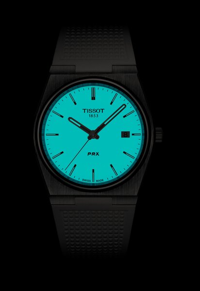 Zegarek męski TISSOT PRX T137.410.17.011.00 z białą tarczą, srebrną kopertą na białym pasku gumowym
